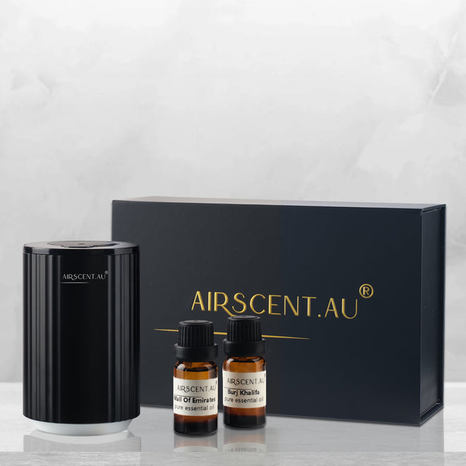 AirScent portable car diffuser with two sample fragrance bottles